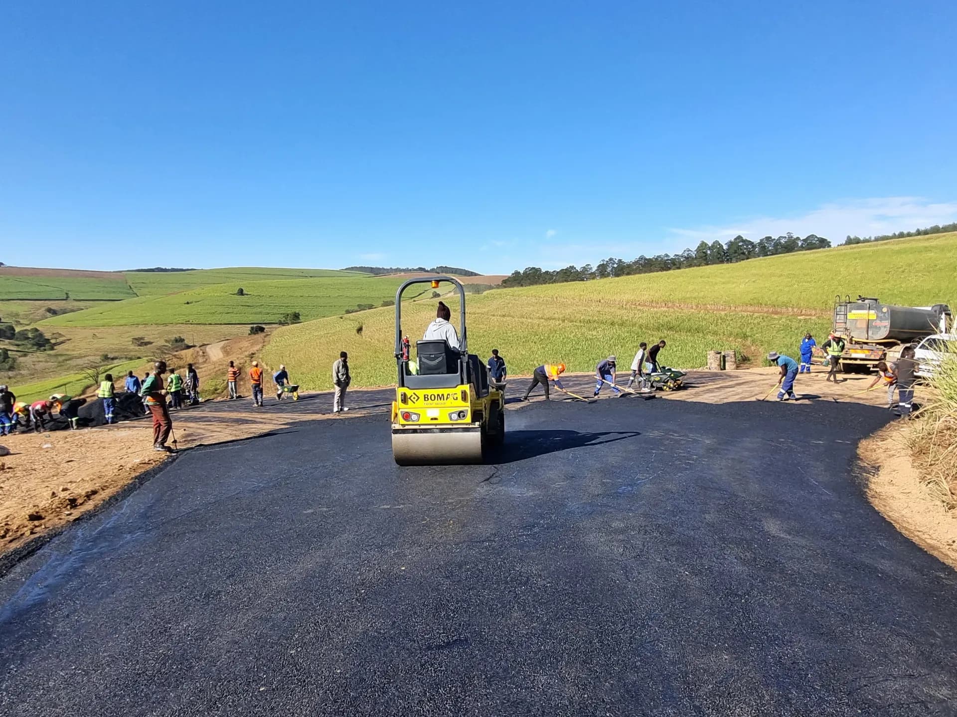 Crew surfacing a rural access road
