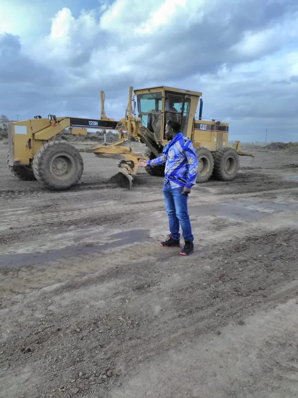 Grader preparing a road formation