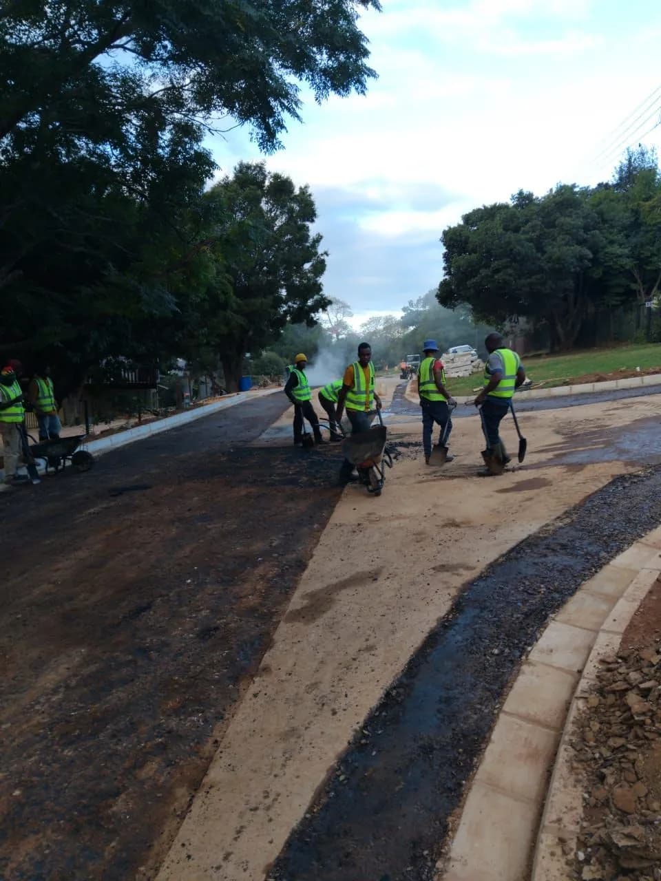 Asphalt surfacing and finishing