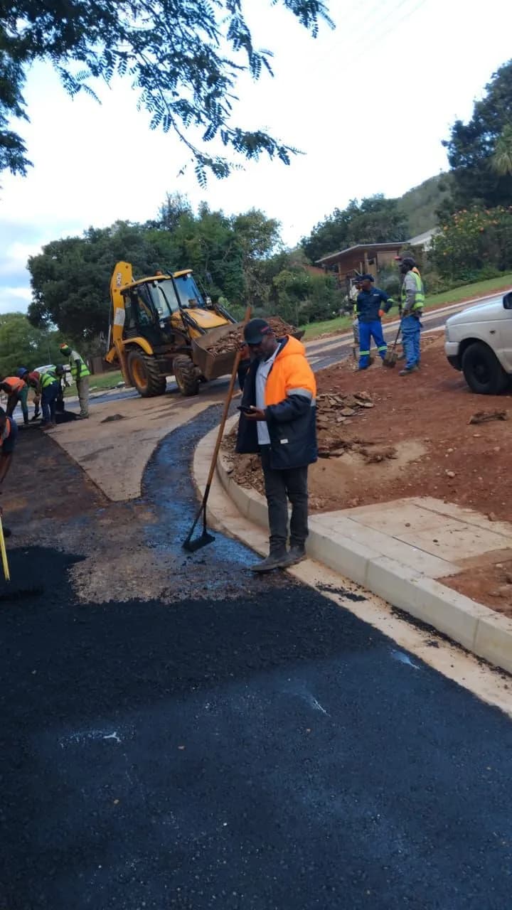 Road construction work with asphalt application