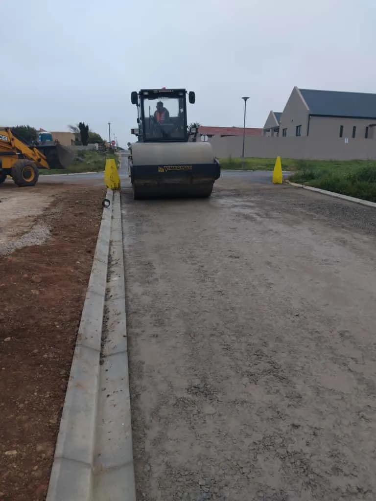 Final base compaction before asphalt